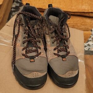 This is a pair of Nike ACG Salbolier hiking shoes in a grey/brown suede and mesh